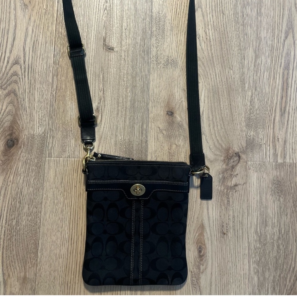 Coach Sleek Black Crossbody Bag with Gold Accents